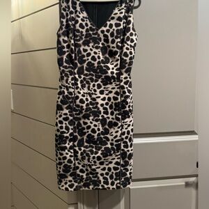 Lightly worn designer dress with sparkle edging!